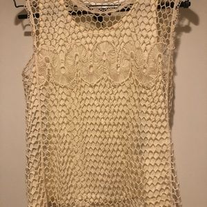 Crochet covered tank in cream. Frilly ends